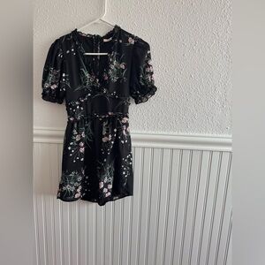 Mi Ami Black Puff Sleeve Floral Francesca Romper | Plunge Neckline | Ruffle Trim